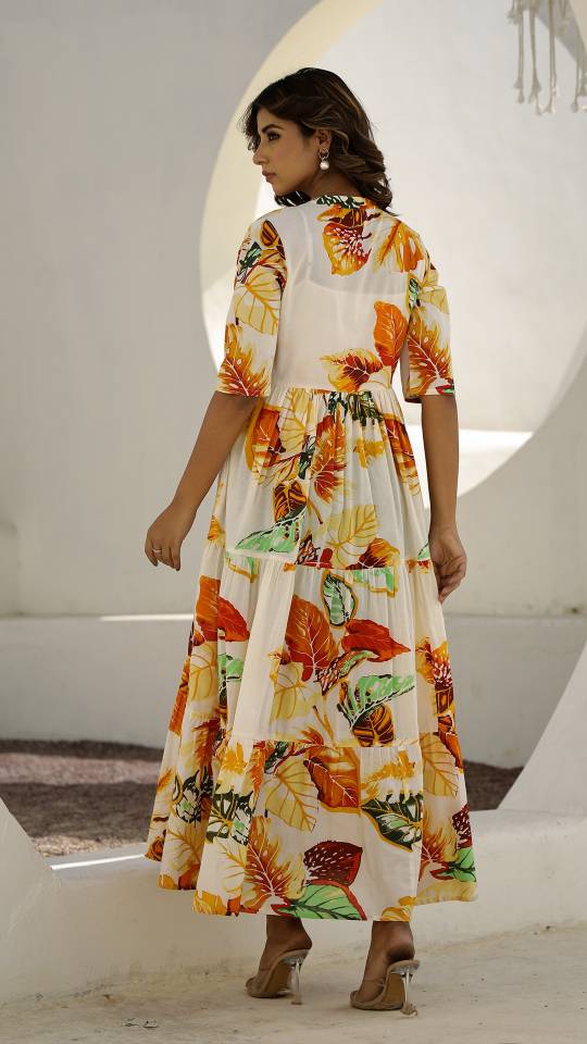 Cream Floral Maxi Dress with Tropical Leaf Patterns | Maxi Dress | Shop stylish women's clothing online at Label Flavia |