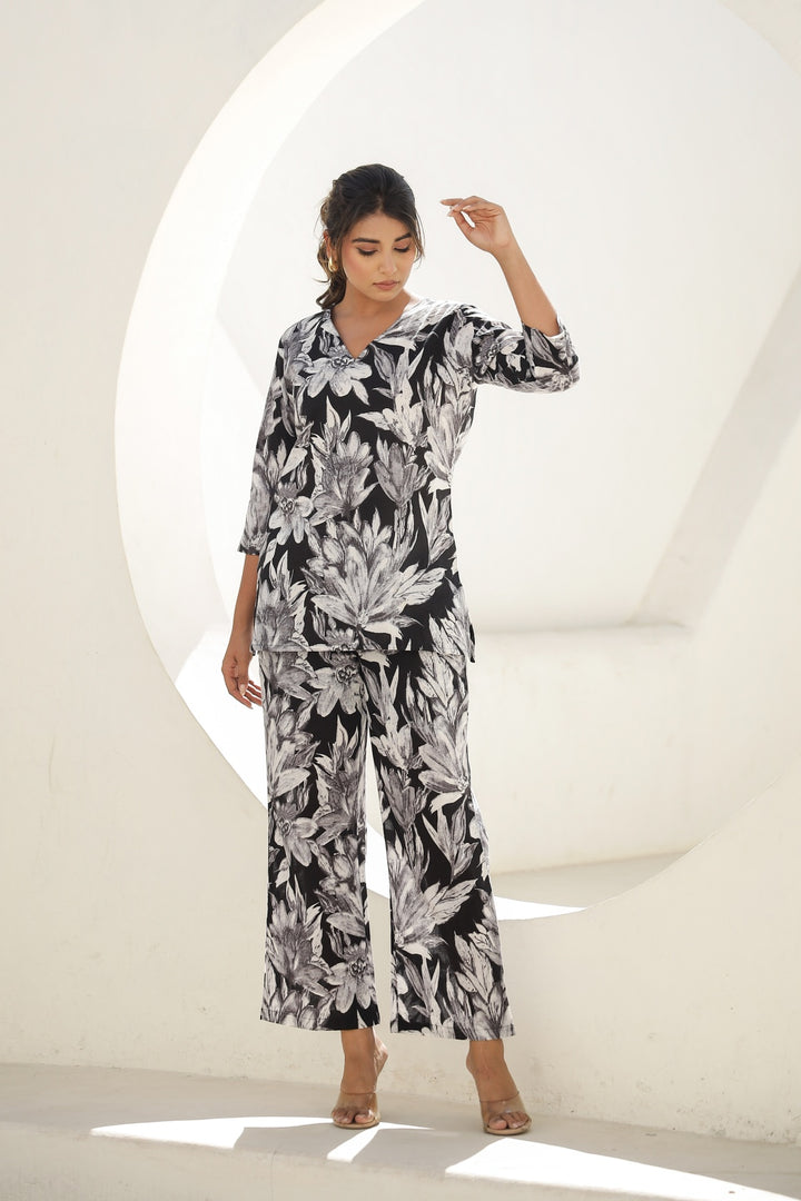 Elegant Black & White Floral Co-Ord Set – V-Neck Top & Wide-Leg Pants